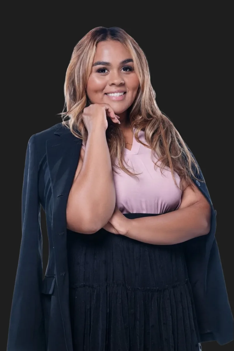 Maria Nuñez, owner of Home Pros cleaning in the Bay Area, smiling in a dark blazer